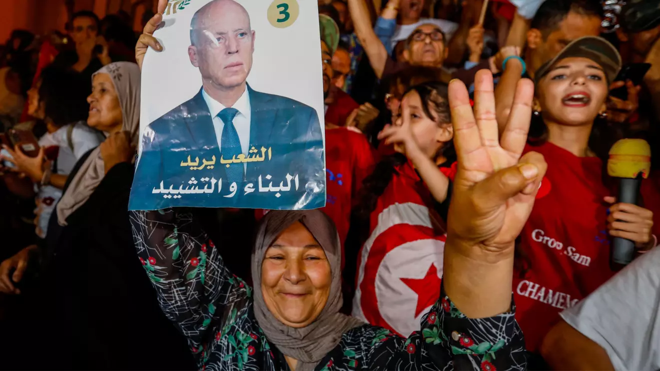 Supporters of Tunisian President Kais Saied, celebrate as exit poll shows Saied won the presidential election in Tunis, Tunisia October 6, 2024. Reuters/Zoubeir Souissi
