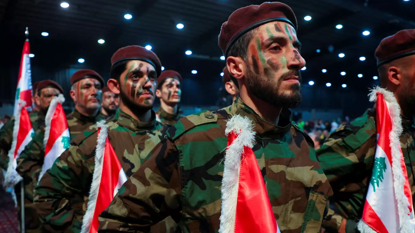 Hezbollah members parade during a rally marking al-Quds Day, (Jerusalem Day) in Beirut's southern suburbs, April 5, 2024. Reuters/Mohamed Azakir