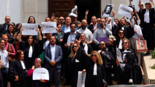 Tunisian court jails prominent critic of president