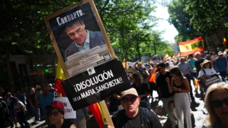 Tens of thousands march in Madrid to demand prime minister's resignation