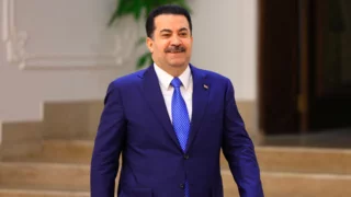 Iraq can disarm factions only when the US withdraws, prime minister says