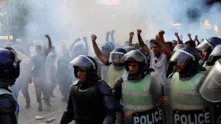 Tensions boil over in Tunis as police clash with protesters
