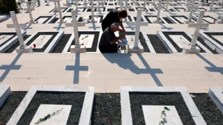 Greeks mourn, Turks celebrate anniversary of invasion that split Cyprus