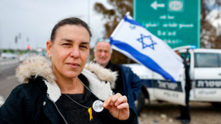 Israelis wear dog tags in solidarity with hostages and each other