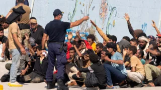 Greek lawmakers vote on North Africa asylum ban as rights groups cry foul
