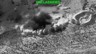 US pounds Iran, Tehran warns of all-out war