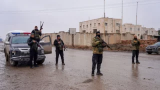 Syrian troops, Kurdish forces poised on front lines as truce deadline looms