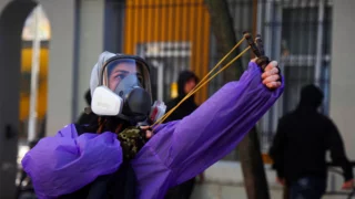 Banks, buildings burn as Albania's capital Tirana erupts into student violence