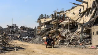 Israel suspends licenses of aid groups in Gaza