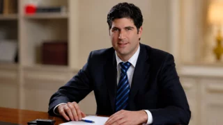 Legal complaint targets banker over Netanyahu dinner