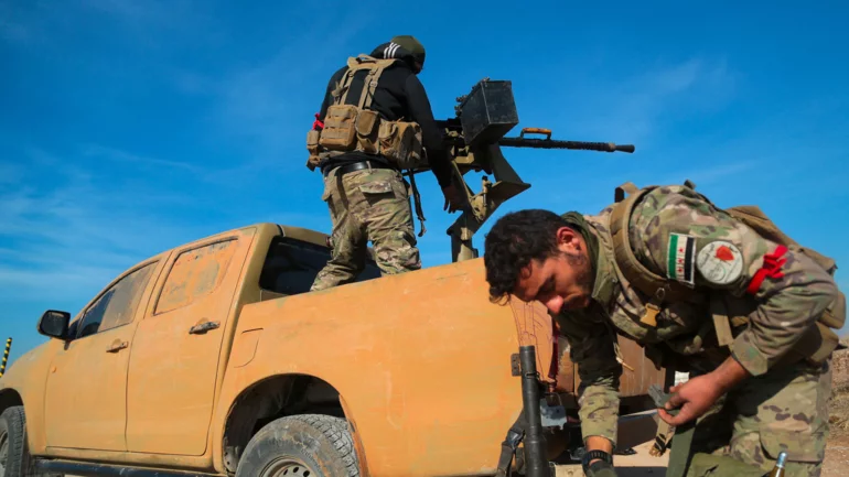 Syrian rebels capture key city of Hama in fresh blow to Assad
