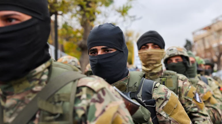 Western powers warn Syria over foreign jihadists in army, sources say