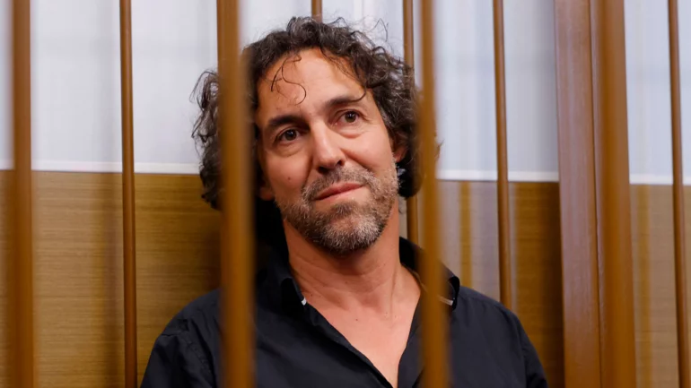 Russia charges detained Frenchman, ex-colleague says he's victim of geopolitics
