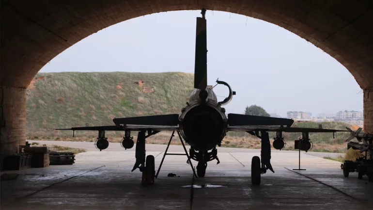 Israeli army says it targeted military headquarters, sites containing weapons in southern Syria