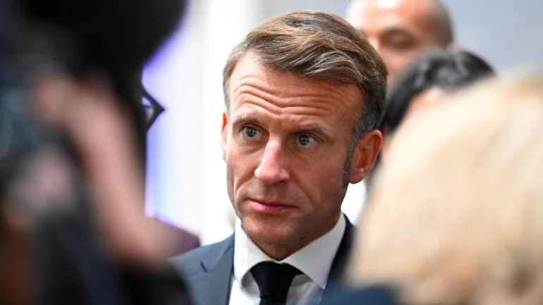 Election calls heap pressure on Macron to end political crisis