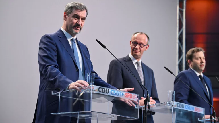 Germany's Merz unveils coalition deal to spur growth, tackle migration