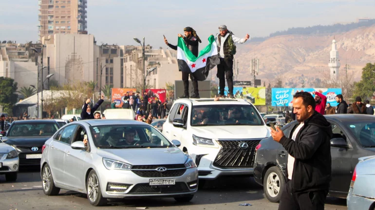 Syrian rebels topple President Assad, Russia says he left the country