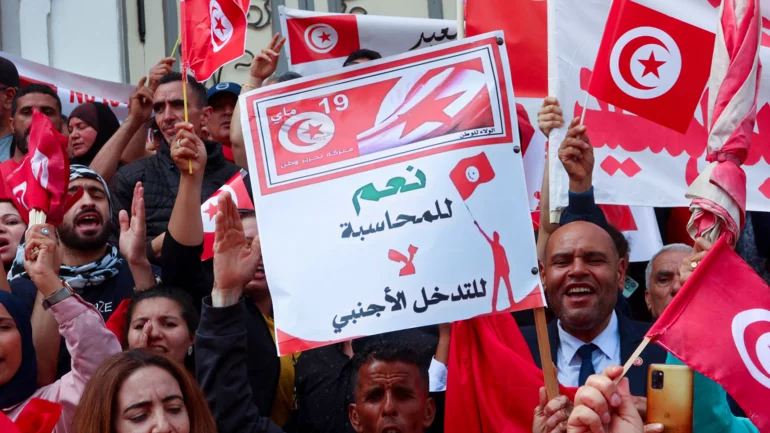 Hundreds of Tunisian president's supporters protest against 'foreign interference'