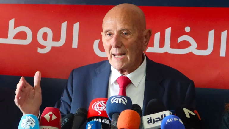 Tunisian police arrest top opposition figure Nejib Chebbi to enforce 12-year jail term, his family says