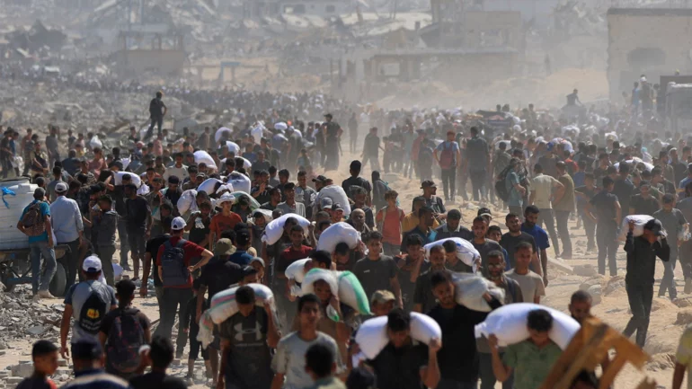 Israeli military announces daily pauses in Gaza areas to allow aid