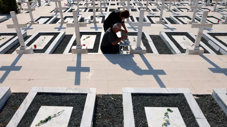 Greeks mourn, Turks celebrate anniversary of invasion that split Cyprus