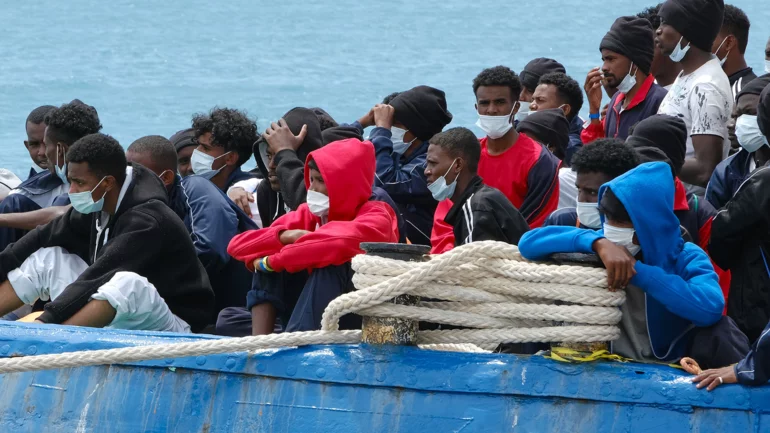 Sixty migrants feared drowned crossing Mediterranean from Libya