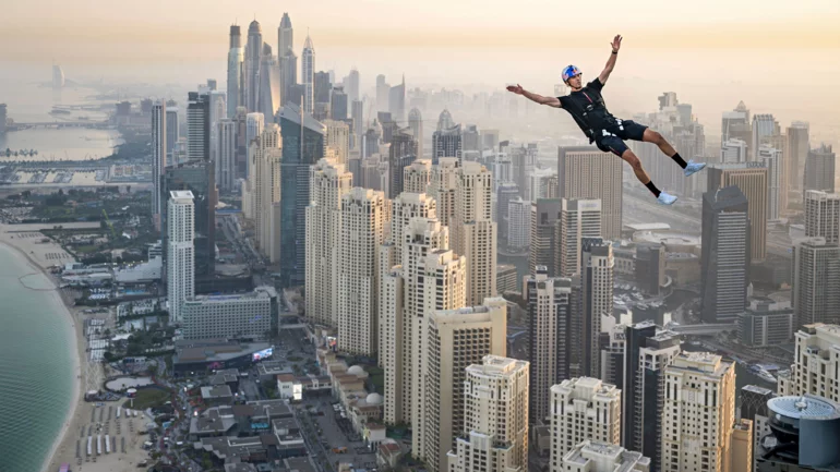 World First: Drone Wakeskating on Dubai Skyscraper's Infinity Pool