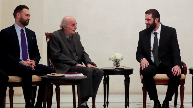 Syria's de facto ruler reassures minorities, meets Lebanese Druze leader
