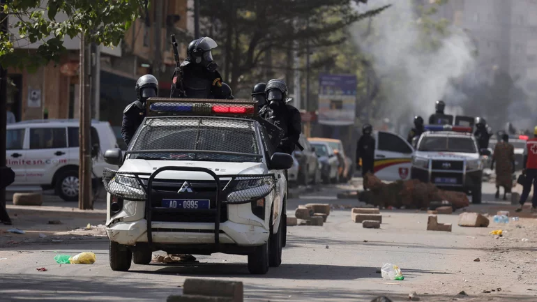 Senegal's Sall promises to hold delayed presidential vote as soon as possible