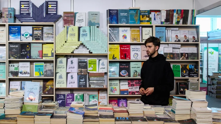 At Damascus book fair, Islamist titles and Kurdish culture echo big shifts