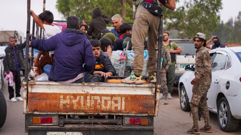 Bedouin civilians evacuate Syria's Sweida as tense truce holds