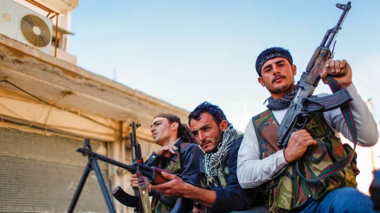 Kurdish fighters under attack by radical Syrian regime