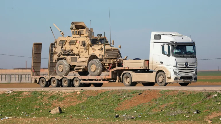 US military begins withdrawing from main base in northeast Syria, Syrian sources say
