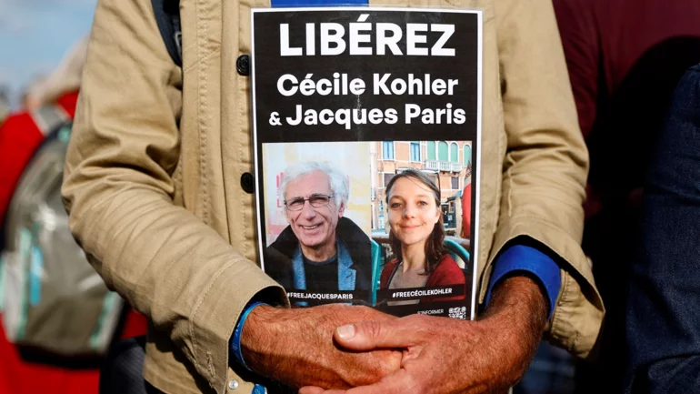 Iran frees two French nationals from prison, Macron says