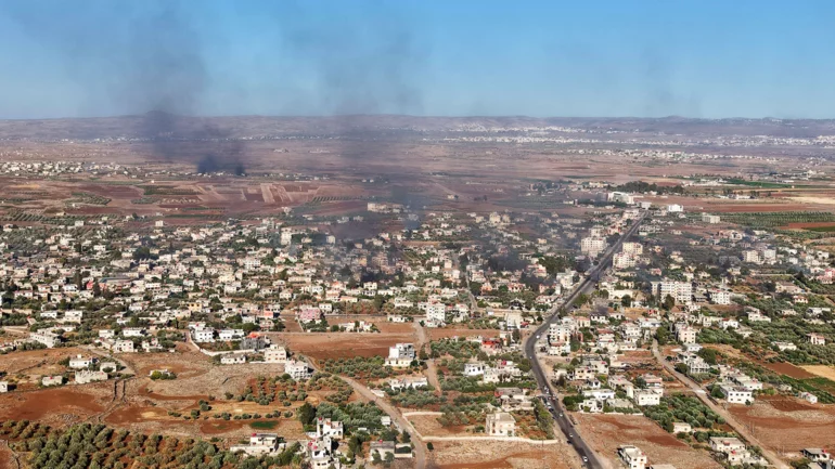 How Syrian attackers killed: One hand on the gun, another on the camera