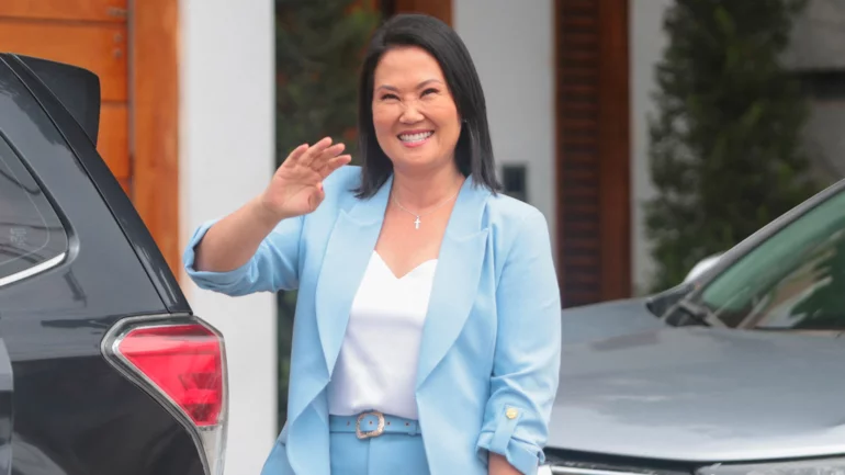 Keiko Fujimori vows to unite a Peru 'split in two' as runoff lead holds