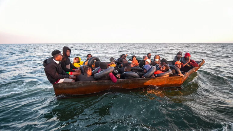 Tunisia detains a prominent activist for migrants' rights