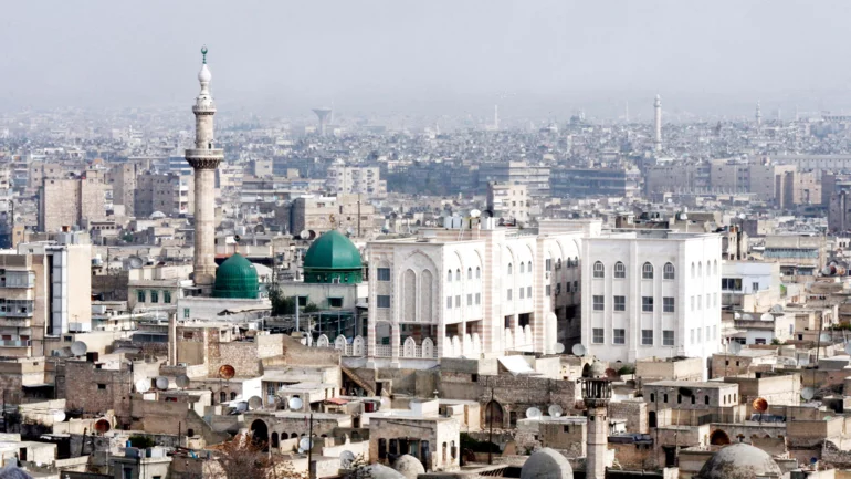 Israeli strikes on Syria kill dozens, security sources say