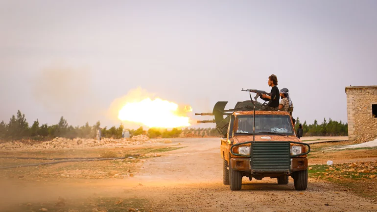 Syria appoints some foreign Islamist fighters to its military, sources say
