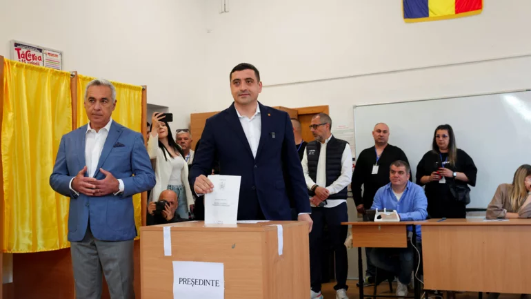 Romanian nationalist Simion on course for election win, early results show