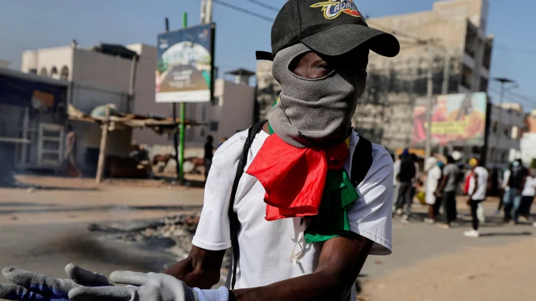 Senegalese police crack down on protests over election delay